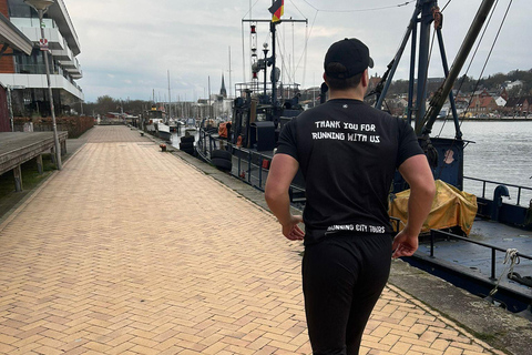 Flensburg: Passeio de corrida com garantia de dicas privilegiadasTour particular