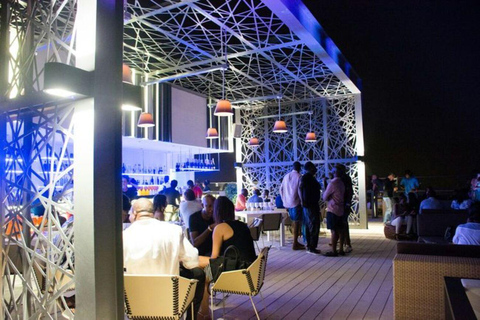 Accra: Instagrammable Nightlife Tour with a welcome drink Accra Tour: 1 Welcome Drink, 360° Skybar Views, & Shopping