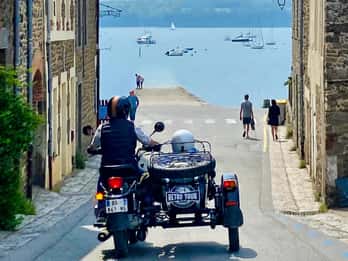 Saint Suliac from Saint Malo in a vintage sidecar with driver