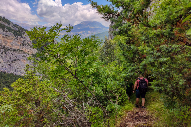 "Pëllumbas Cave and Erzeni River: Hiking and Swimming"