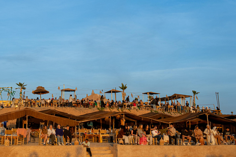 Au départ de Marrakech : Excursion dans le désert au coucher du soleil avec balade à dos de chameau et dîner