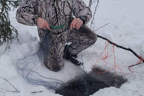 Rovaniemi: Ice Fishing, Snowmobile, and Net Fishing Tour
