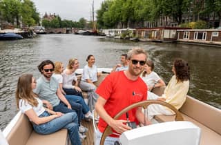 Amsterdam: Grachtenfahrt im offenen Boot im Stadtzentrum