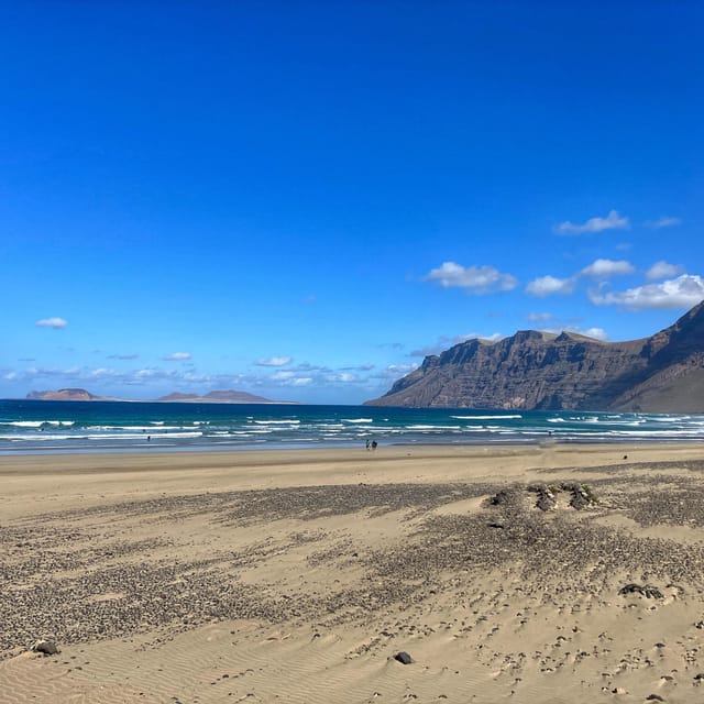 Lanzarote Longboard surf lesson on Famara beach all levels GetYourGuide