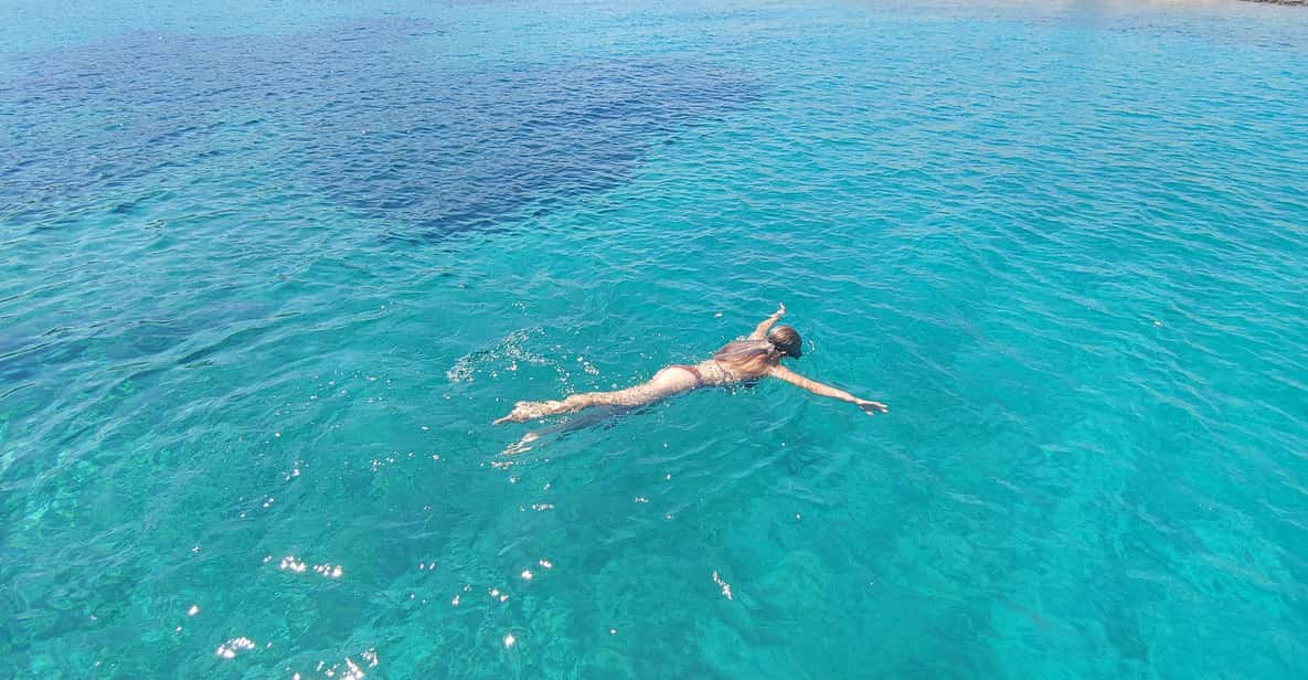 Antiparos & Despotiko Kaiki Cruise — Coves, Swim & BBQ — a boat tour from Paros, Greece