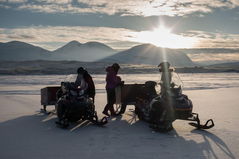 Abisko: Snowmobile Sled Expedition with Snack and Hot Drink