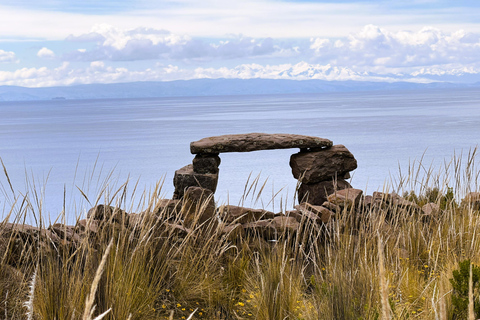 From Puno: Lake Titicaca 2-Day Tour with Homestay From Puno: 2-Day Guided Tour with Fixed Pickup Point