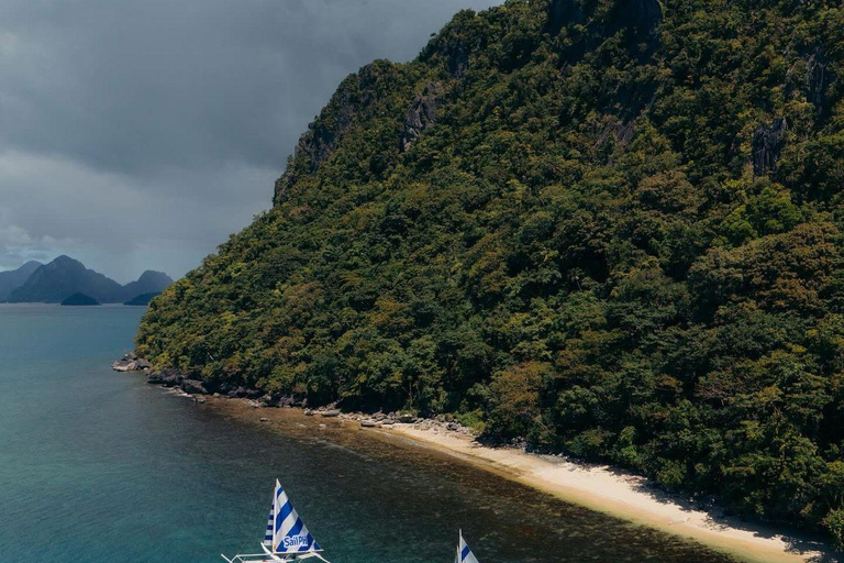 El Nido: Private Falls, Surf & Sunset Sailing Experience