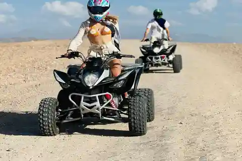Marrakech: Quads & Kamele bei Sonnenuntergang und Abendessen mit Feuershow