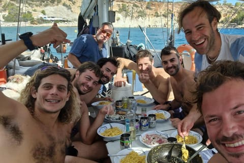 Ibiza Sailboat Expedition - Spearfishing and cooking the fish on board