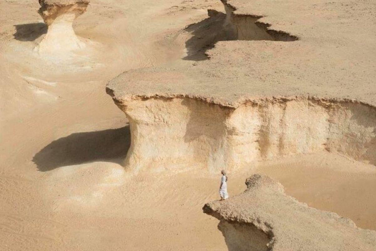 Doha: City Highlights, West of Qatar and Cave Tour with Meal