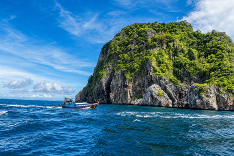 From Phi Phi: Iconic Bays by Longtail—Beach, Lagoon, Snorkel Phi Phi: Longtail Join Trip — Bays, Beach & Snorkeling