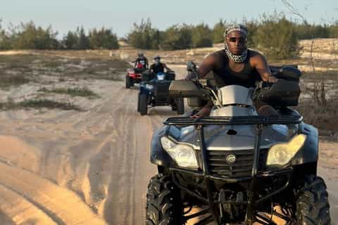 Lac Rose: Quad or 4x4, canoe, camel, and lunch with pool access