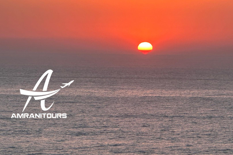 Paseo en camello al atardecer en la playa con cena incluida