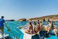 Comino, Blue Lagoon, Crystal Lagoon, and Seacaves Tour - Housity
