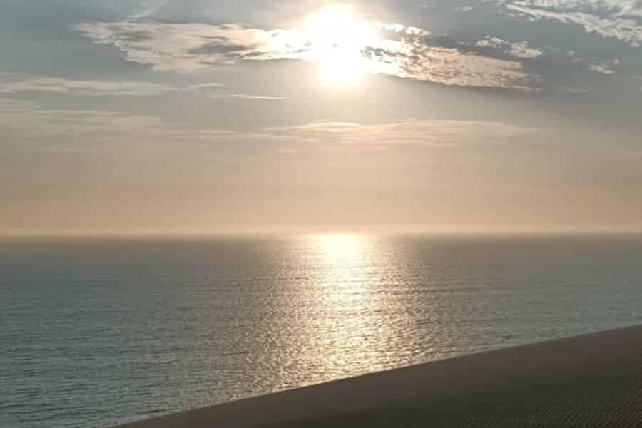 Sandwich Harbour: Sonnenuntergangstour mit Dünenfahrt & Meerblick. Foto: GetYourGuide Sandwich Harbour: Sonnenuntergangstour mit Dünenfahrt & Meerblick. Foto: GetYourGuide