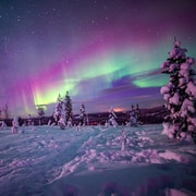Aventure nocturne en raquettes sous les aurores boréales