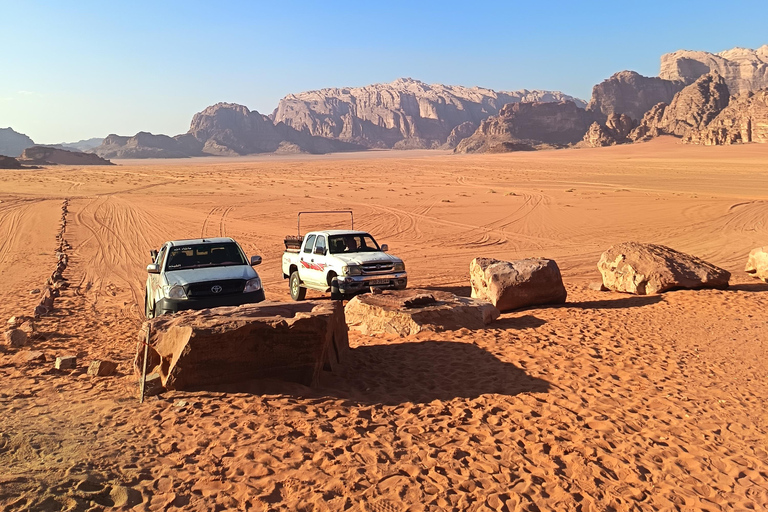 overnight: sleep under the stars in the cave in Wadi Rum Protected Area Caml tour