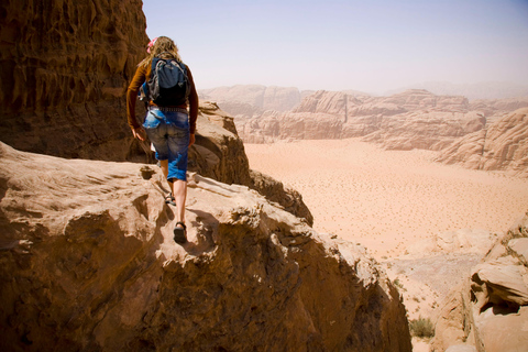 From Wadi Rum: Hike a Mountain with Guide & Stay (optional) Burdah Rock Bridge Mountain Day & Free Lunch Only