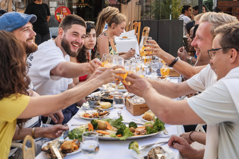 Lisbonne : visite culinaire à pied de la Baixa avec boissonsVisite de groupe