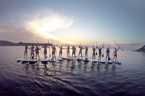 SUNSET PADDLE SURF TOUR OP DE BESTE MAGISCHE PLEKKEN