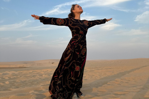 Doha: Arabic Costume, Desert Safari, Sandboarding & More Group Tour with Camel Ride in traditional Arabic Costume