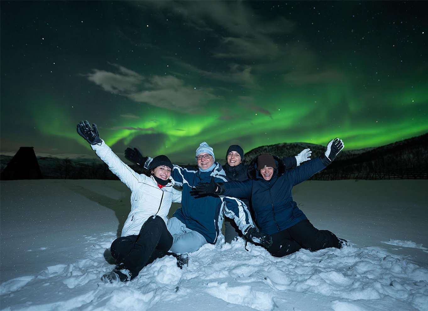 Tromsø: Nordlys i minibus med gratis fotos og et varmt måltid