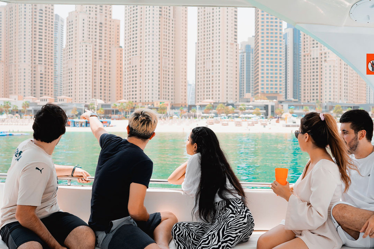 Dubai, Dubai Marina Sightseeing-kryssning med utsikt över Ain WheelSightseeingkryssning i småbåtshamn ombord på en yacht