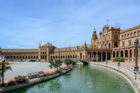 Seville: Alcázar Exterior, Cathedral, Santa Cruz, and Guadalquivir Shared Tour in Arabic from Malaga: Seville and Santa Cruz
