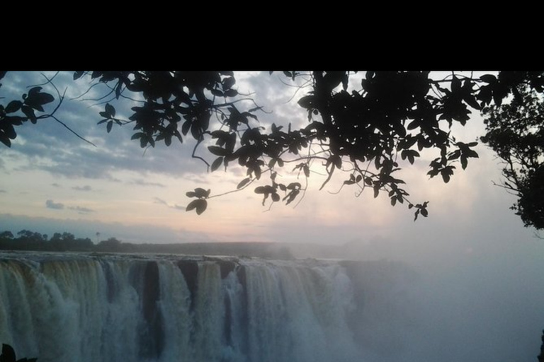 Victoria Falls Sunrise Guided Tour & Local Market Experience Victoria Falls: Sunrise Guided Tour with Souvenir Market