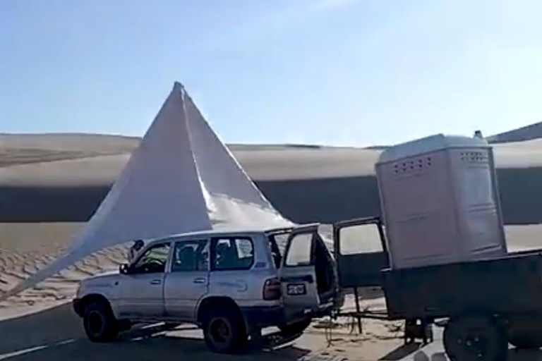 Huacachina: Overnight Camping with Sandboarding/Sandsky, Bar, BBQ, and Campfire