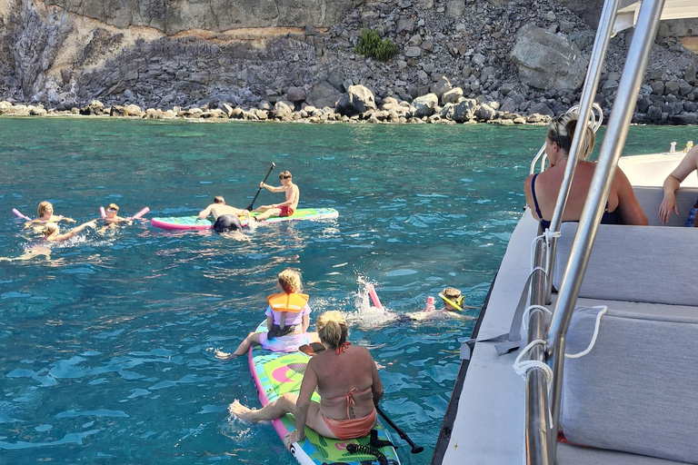Puerto Rico, Grande Canarie : excursion en bateau, boissons, repas, paddle surf, plongée avec tuba.Profitez du paddle surf et de la plongée avec tuba dans les criques de Grande C