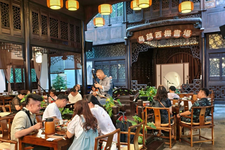 From Hangzhou: Wuzhen Water Town Tour with Riverside Essence Guide for other languages