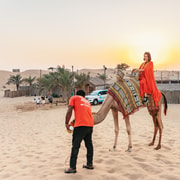 Dubai: Red Dunes Safari, Camel Ride, BBQ & Al Marmoom Oasis | GetYourGuide