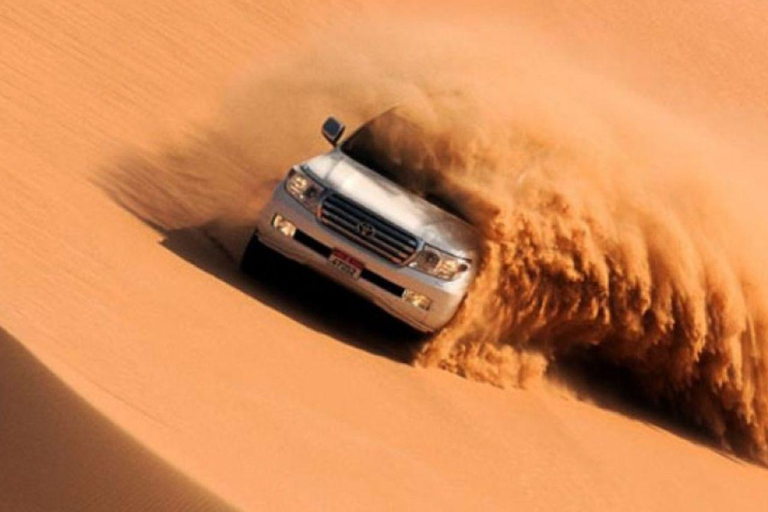 Odisseia no deserto de Doha: emoção, cultura e pôr do sol com guiaOdisseia no deserto de Doha: emoção, cultura e pôr do sol