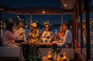 Amsterdam: Abendliche Luxus-Bootsfahrt mit unbegrenztem Prosecco & Snack