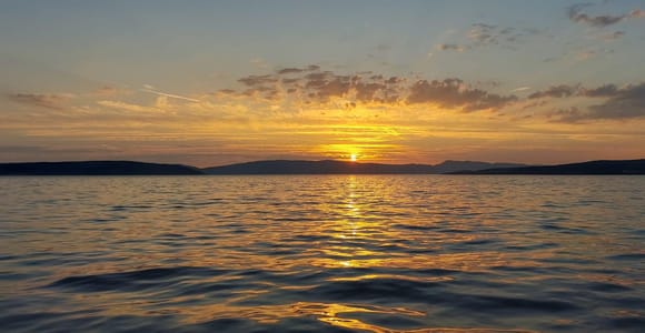Golden excursion Punat, sunset tour to wild bays