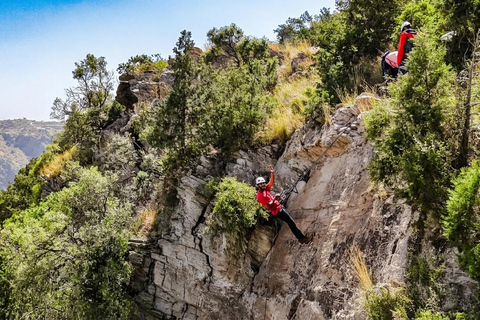 Tanomah: Abseiling Adventure Experience (Rappelling) A group of 4 people