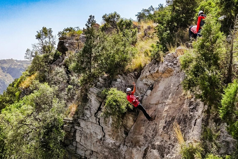 Tanomah: Abseiling Adventure Experience (Rappelling) A group of 4 people