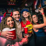 Amsterdam: Giro dei pub del quartiere a luci rosse con shot illimitati
