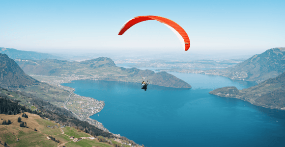 Lucerne: Tandem Flight Complete Package – on Lake Lucerne or in Engelberg