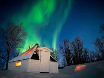 Overnight in a glass-roof lavvo in Lyngen