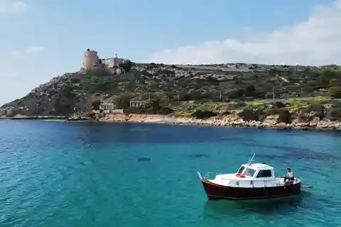 Cagliari: Boat Tour to the Devil's Saddle with Snorkeling and Aperitif