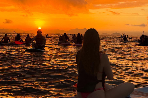 See the Sunrise in Copacabana from a Stand Up Paddleboard with Photos