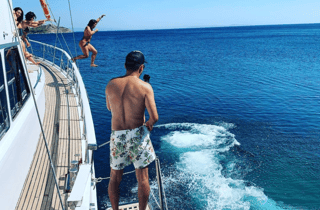 Mykonos: Crociera a Delos e alle isole Rhenia con pranzo al barbecue