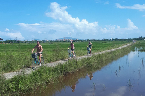 Funny day Biking, Farming, Buffalo riding and Basket boat private tour for solo traveler from Da Nang with transfer