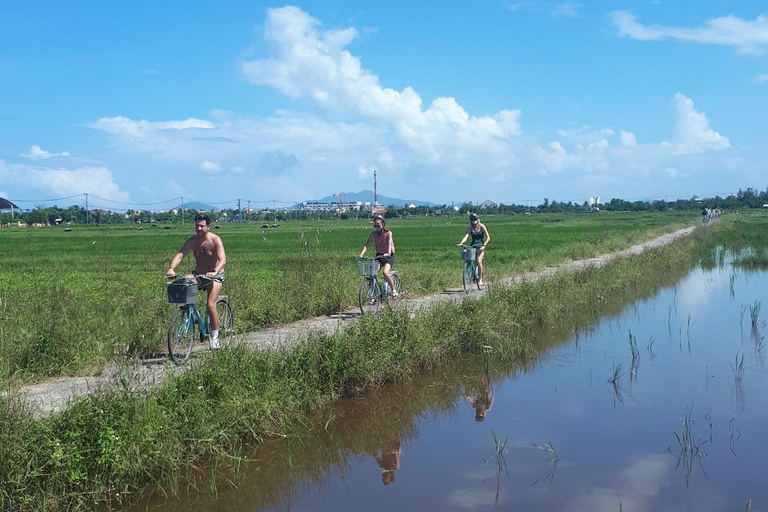 Funny day Biking, Farming, Buffalo riding and Basket boat private tour for solo traveler from Da Nang with transfer