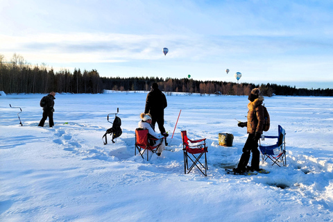 Aventura de pesca en hielo en Levi con sopa de salmón