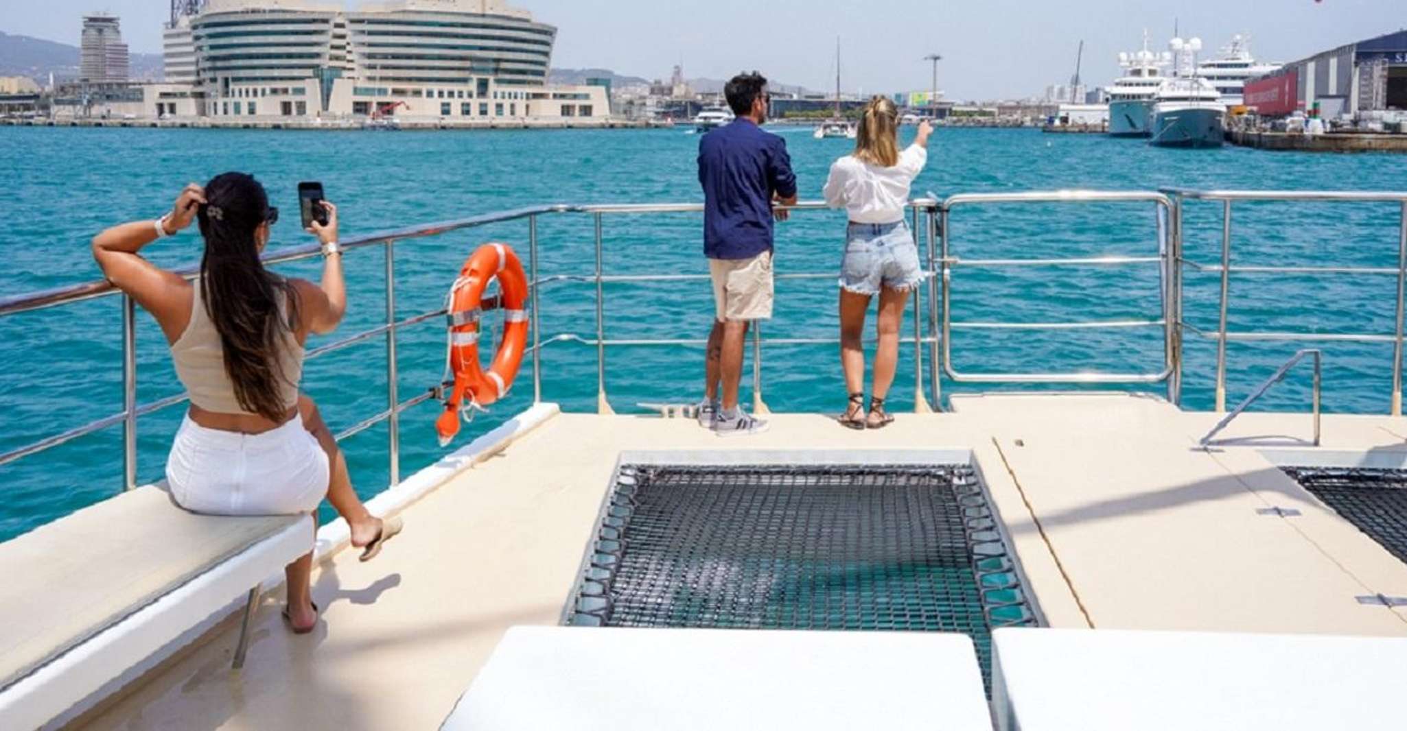 Barcelona: Daytime or Sunset Catamaran Cruise with Music photo 3