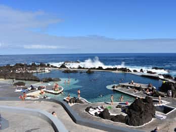 Tour particular, serviço de busca gratuito no porto, Skywalk e piscinas naturais de lava